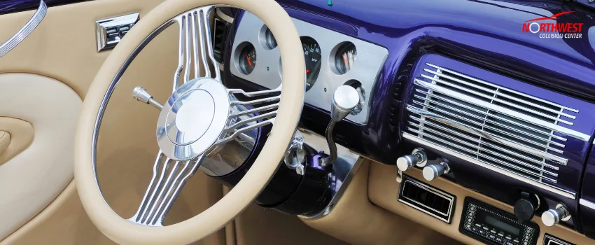 A fully restored classic car dashboard and steering wheel